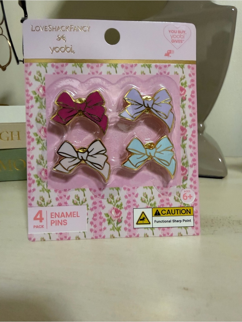 LoveShackFancy Enamel Bow Pin Set in Magenta, White, Pale Blue, Lavender